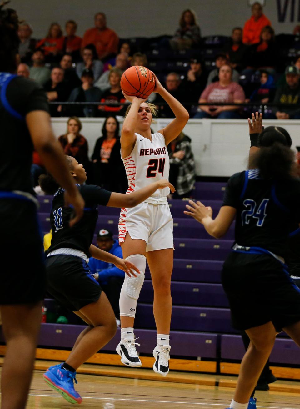 Republic's Kaemyn Bekemeier shoots a three-pointer as the Lady Tigers take on the Raytown Lady Jays in a Class 6 girls quarterfinal matchup at Southwest Baptist University on Saturday, March 11, 2023.