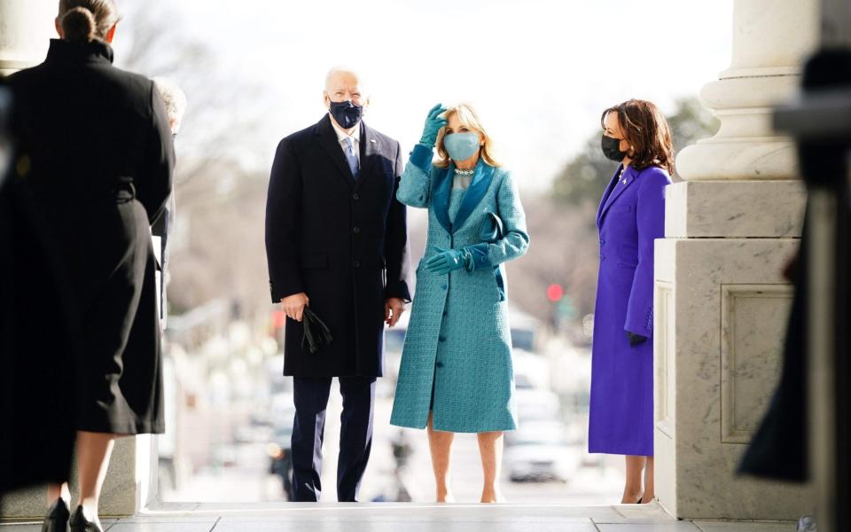 President-elect Joe Biden (L) and Jill Biden (C) with Vice President-elect Kamala Harris (R) arrive at the East Front of the US Capitol for his inauguration ceremony to be the 46th President of the United States in Washington, DC, on January 20, 2021 - GETTY IMAGES