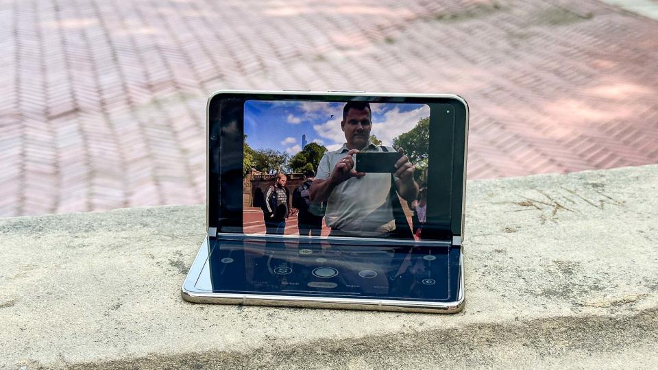 Google Pixel Fold shown in hand