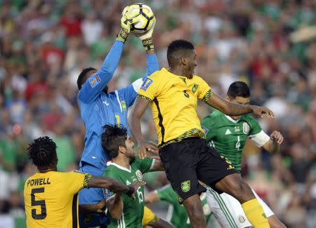 July 23, 2017; Pasadena, CA, USA; Jamaica goalkeeper Andre Blake (1) makes a save against Mexico during the second half at Rose Bowl. Gary A. Vasquez-USA TODAY Sports