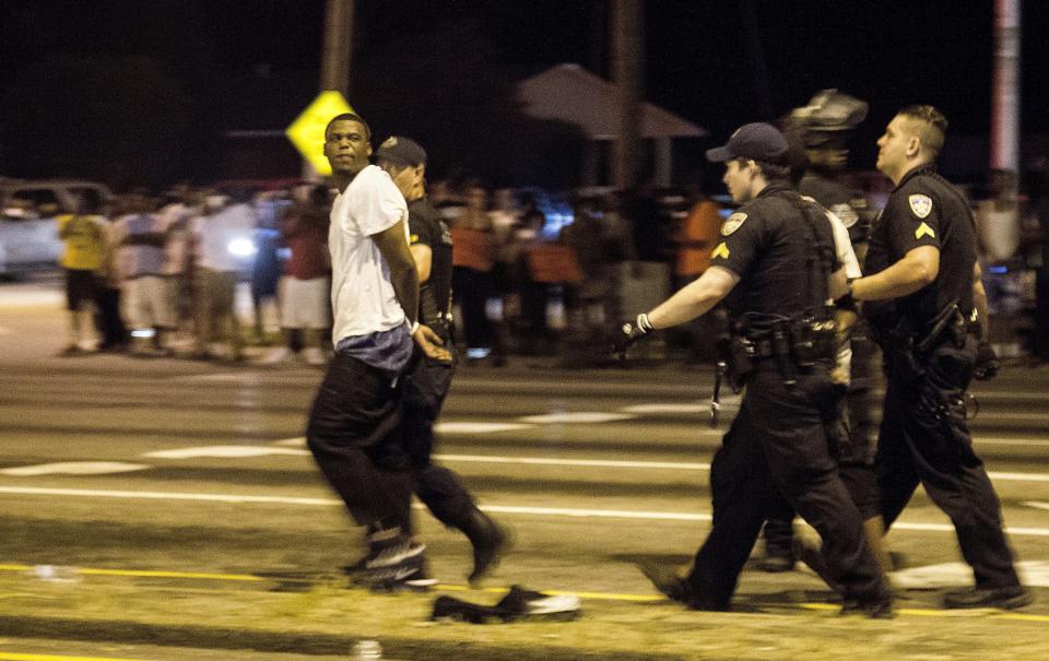 BATON ROUGE, LA -JULY 09: Baton Rouge police removed protesters that were arrested on July 9, 2016 in Baton Rouge, Louisiana. Alton Sterling was shot by a police officer in front of the Triple S Food Mart in Baton Rouge on July 5th, leading the Department of Justice to open a civil rights investigation. (Photo by Mark Wallheiser/Getty Images)