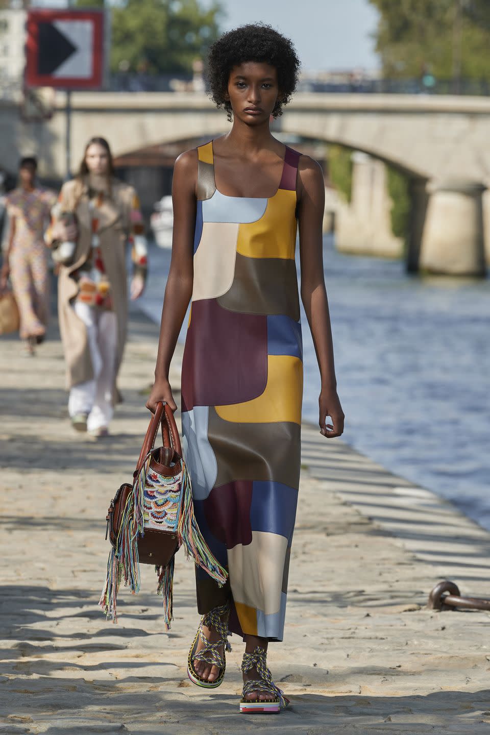 <p>Leading the show notes for Chloé's spring/summer 2022 collection was a quote from Aldous Huxley about love.</p><p>"Of all the worn, smudged, dog-eared words in our vocabulary, 'love' is surely the grubbiest, smelliest, slimiest. Bawled from a<br>million pulpits, lasciviously crooned through hundreds of millions of loudspeakers, it has become an outrage to good taste and decent<br>feeling, an obscenity which one hesitates to pronounce. And yet it has to be pronounced; for, after all, Love is the last word."</p><p>As well as the concept of love inspiring the collection was a celebration of craft, where it is expanding the number of our products handcrafted by independent artisans. </p><p>"We are embossing all of these products with a signature spiral<br>symbol. Chloé Craft seeks to pioneer new levels of traceability and transparency in the industry and establish a deeper connection between consumers and local producers. These techniques cannot be mimicked by machinery, only mastered by the human hand."</p>