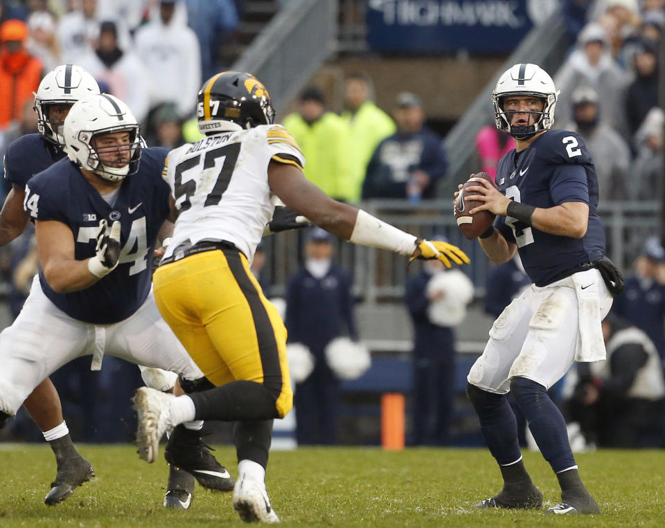 Penn State quarterback Tommy Stevens (2) drops back to pass against Iowa during the first half of an NCAA college football game in State College, Pa., Saturday, Oct. 27, 2018. (AP Photo/Chris Knight)