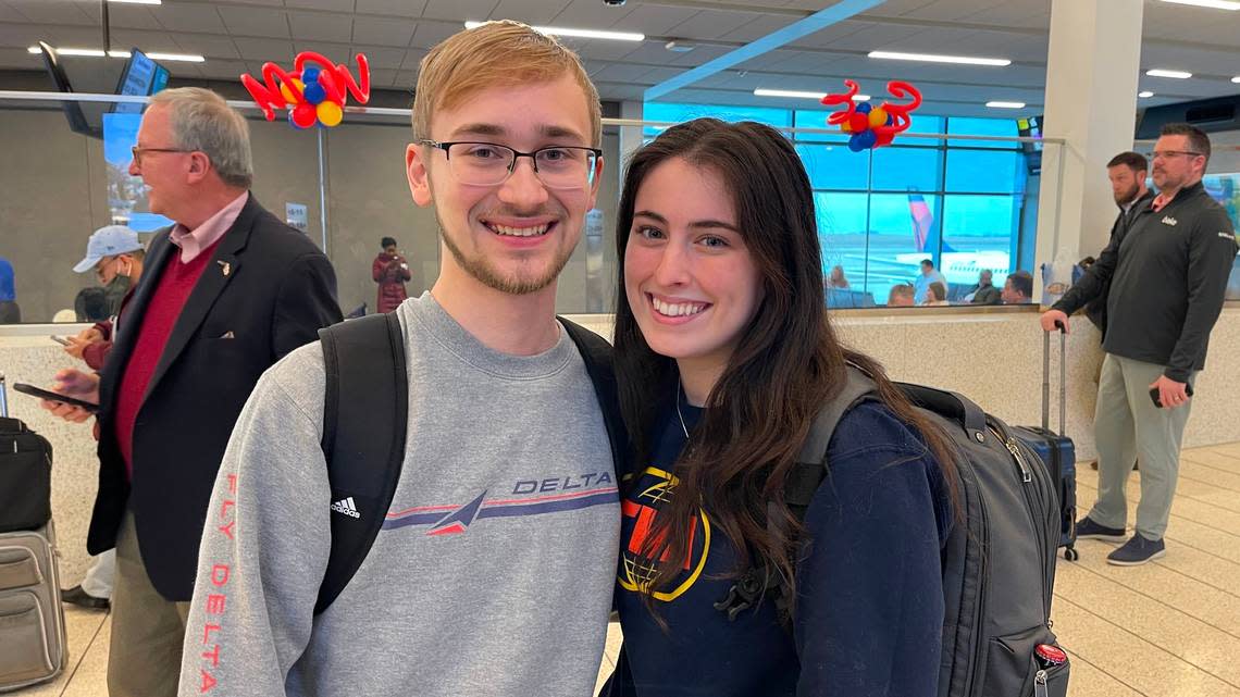 Haylie Hensley and her boyfriend Ashton Liberty from Kansas City flew out on the last flight leaving the old terminals Monday, and returned on the first flight to the new terminal.