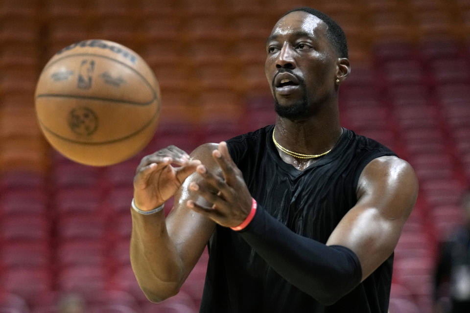 Miami Heat center Bam Adebayo warms up before an NBA basketball game against the Minnesota Timberwolves, Monday, Dec. 18, 2023, in Miami. Adebayo has been cleared to return to the lineup after an injury. (AP Photo/Lynne Sladky)