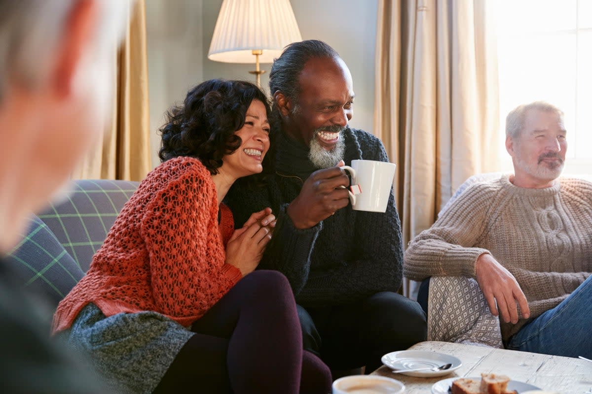 Socialising may help stave off dementia (Alamy/PA)