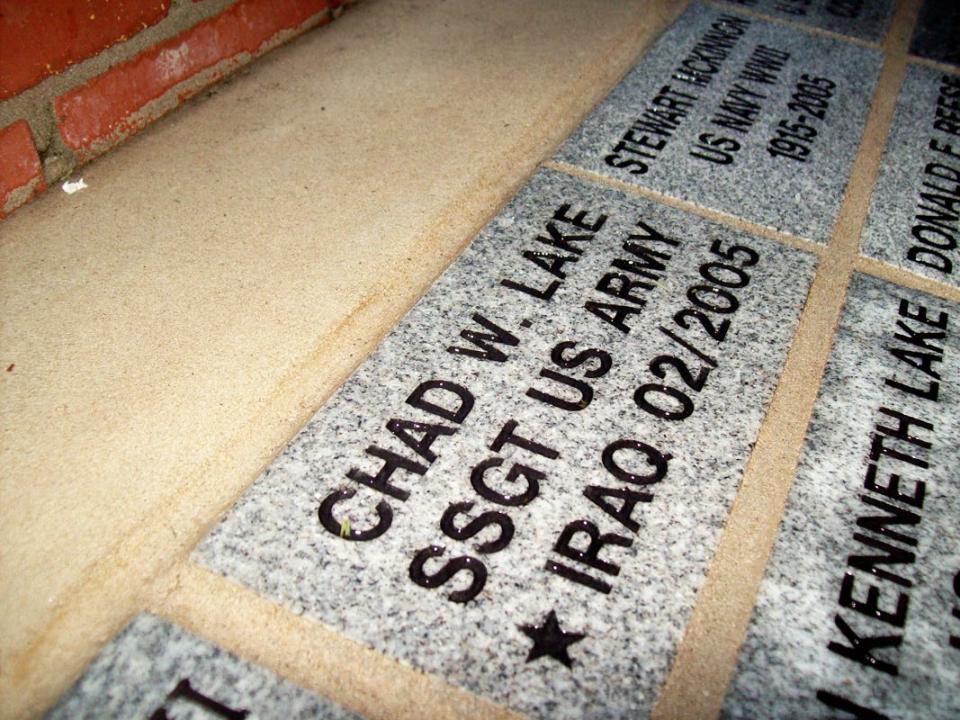 A brick in honor of Marion County soldier Chad Lake rests in a memorial. Libby Rawson, with AMVETS Post 19 in Fort McCoy, is spearheading a drive to purchase and erect a monument at the Ocala-Marion County Veterans Memorial Park to commemorate local soldiers who died in military service from 2001 to present.