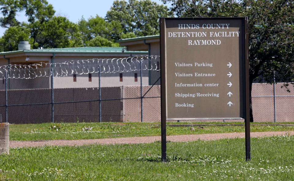 Rolls of razor wire are strung along the perimeter of the Hinds County Detention Center in Raymond, Miss.