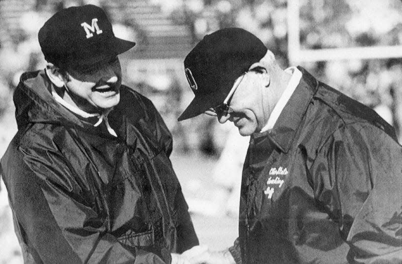 Michigan coach Bo Schembechler, left, and Ohio State's legendary Woody Hayes, shown here before the 1975 game, provided much of the fuel in the Ohio State-Michigan rivalry, which resumes Saturday as a No. 2 vs. No. 3 showdown.
