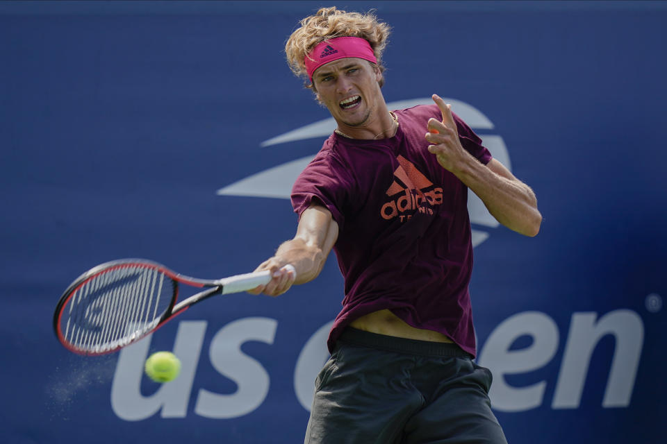 FILE - In this Friday, Aug. 21, 2020, file photo, Germany's Alexander Zverev returns a shot during a practice session at the Western & Southern Open tennis tournament in New York. Zverev is scheduled to play in the U.S. Open, scheduled for Aug. 31-Sept. 13, 2020.(AP Photo/Frank Franklin II, File)