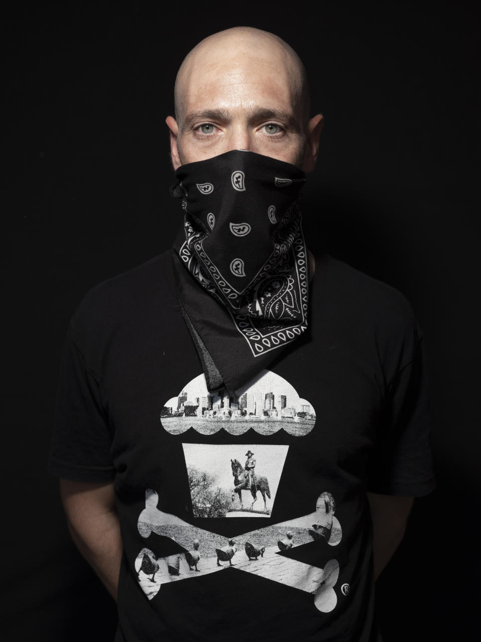 Nir Barak, 35, poses for a photo during a protest against Israel's Prime Minister Benjamin Netanyahu, outside his residence in Jerusalem, Thursday, July 23, 2020. The wave of colorful and combative demonstrations against Netanyahu and his perceived failure to handle the country's deepening economic crisis have been characterized by youth. With flags, facemasks, drums, placards and an assortment of props, thousands have been taking to the streets to demand change in a variety of unique ways. (AP Photo/Oded Balilty)