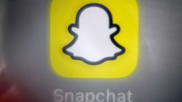 PHOTO: The logo of the social network and messaging app Snapchat on a smartphone screen. (Kirill Kudryavtsev/AFP via Getty Images)