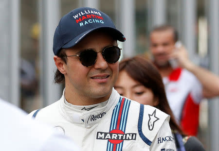 FILE PHOTO: Formula One F1 - Japanese Grand Prix 2017 - Suzuka Circuit, Japan - October 7, 2017. Williams' Felipe Massa of Brazil walks after qualifying. REUTERS/Toru Hanai