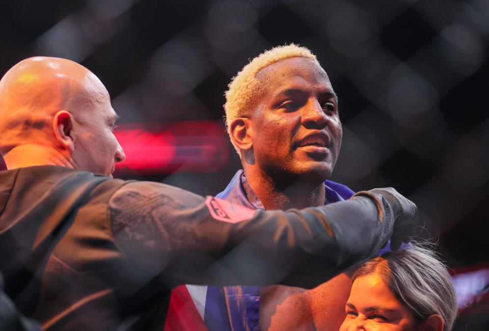 Mar 9, 2024; Miami, Florida, USA; Robelis Despaigne, in Cuban flag, reacts after defeating Josh Parisian, not shown, during UFC 299 at Kayesa Center. Mandatory Credit: Sam Navarro-USA TODAY Sports