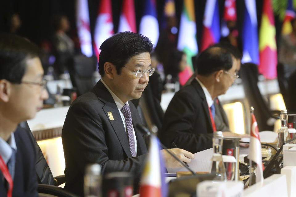 FILE - Singaporean Finance Minister Lawrence Wong, center, attends the plenary session during the ASEAN Finance Ministers and Central Bank Governors meeting in Nusa Dua, Bali, Indonesia on Friday, March 31, 2023. Singapore’s deputy leader Wong is set to be sworn in Wednesday, May 15, 2024, as the nation’s fourth prime minister in a carefully planned political succession designed to ensure continuity and stability in the Asian financial hub. (AP Photo/Firdia Lisnawati, File)