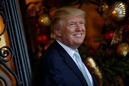 U.S. President-elect Donald Trump speaks briefly to reporters between meetings at the Mar-a-lago Club in Palm Beach, Florida, U.S. December 28, 2016. REUTERS/Jonathan Ernst