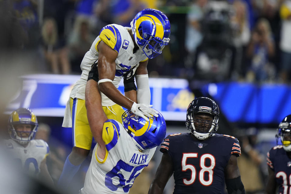 Los Angeles Rams wide receiver Robert Woods, above, celebrates with teammate center Brian Allen after scoring a touchdown during the second half of an NFL football game against the Chicago Bears, Sunday, Sept. 12, 2021, in Inglewood, Calif. (AP Photo/Jae C. Hong)