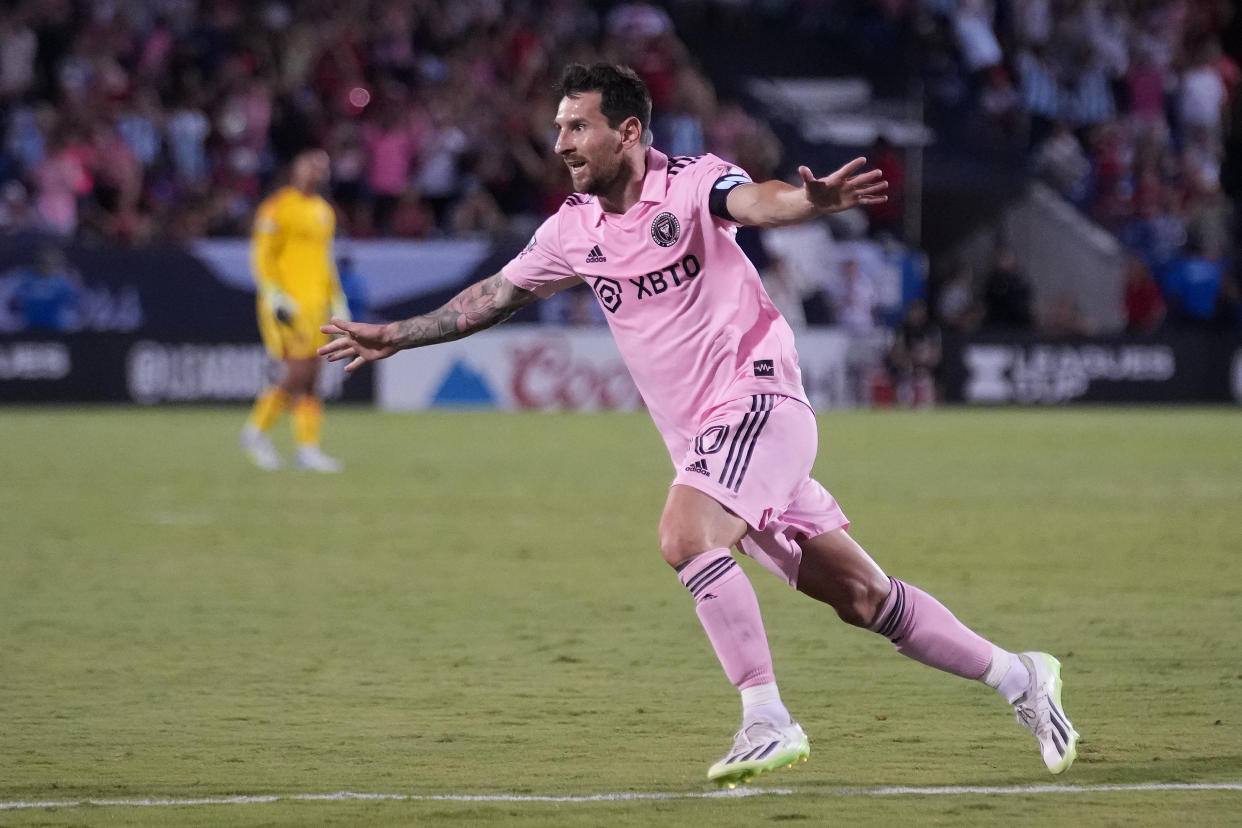 Lionel Messi bookended regulation with a pair of dramatic goals, including a game-tying effort in the 84th minute. (Alex Bierens de Haan/Getty Images)