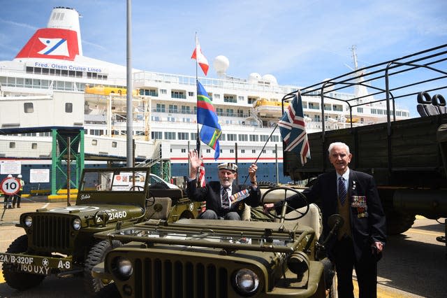 John Roberts, sitting in the jeep, is one of 13 veterans from 12 allied countries whose names are being added to the Normandy Memorial Wall to mark 100 days until the 80th anniversary of D-Day 