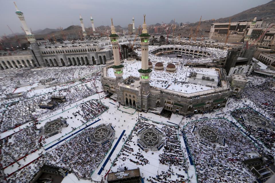 Pilgrims pray at the Grand Mosque