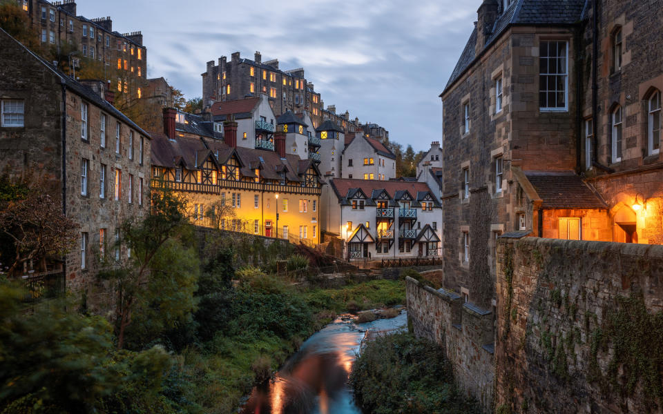 A small river running between houses in Edinburgh