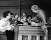 <p>Lucille is in stitches as she works with young aspiring actresses in her acting class, The Desilu Workshop. The actress, who attended drama school in New York City, was initially <a href="https://www.biography.com/actor/lucille-ball" rel="nofollow noopener" target="_blank" data-ylk="slk:told that she was too shy;elm:context_link;itc:0;sec:content-canvas" class="link ">told that she was too shy</a> to become a successful performer. </p>