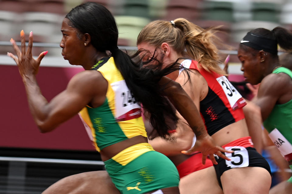 Jamaica's Shelly-Ann Fraser-Pryce (left) headlined the list of semifinal qualifiers in the women's 100-meter race at the Olympics. (Photo by ANDREJ ISAKOVIC/AFP via Getty Images)