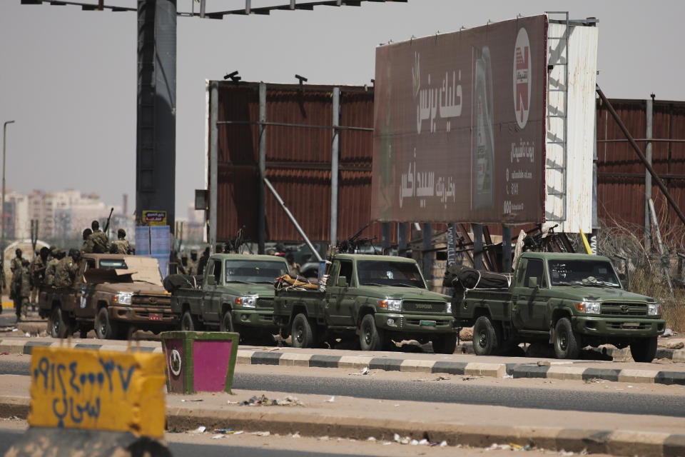 Sudanese security forces are deployed during a protest a day after the military seized power Khartoum, Sudan, Tuesday, Oct. 26, 2021. The takeover came after weeks of mounting tensions between military and civilian leaders over the course and the pace of Sudan's transition to democracy. (AP Photo/Marwan Ali)