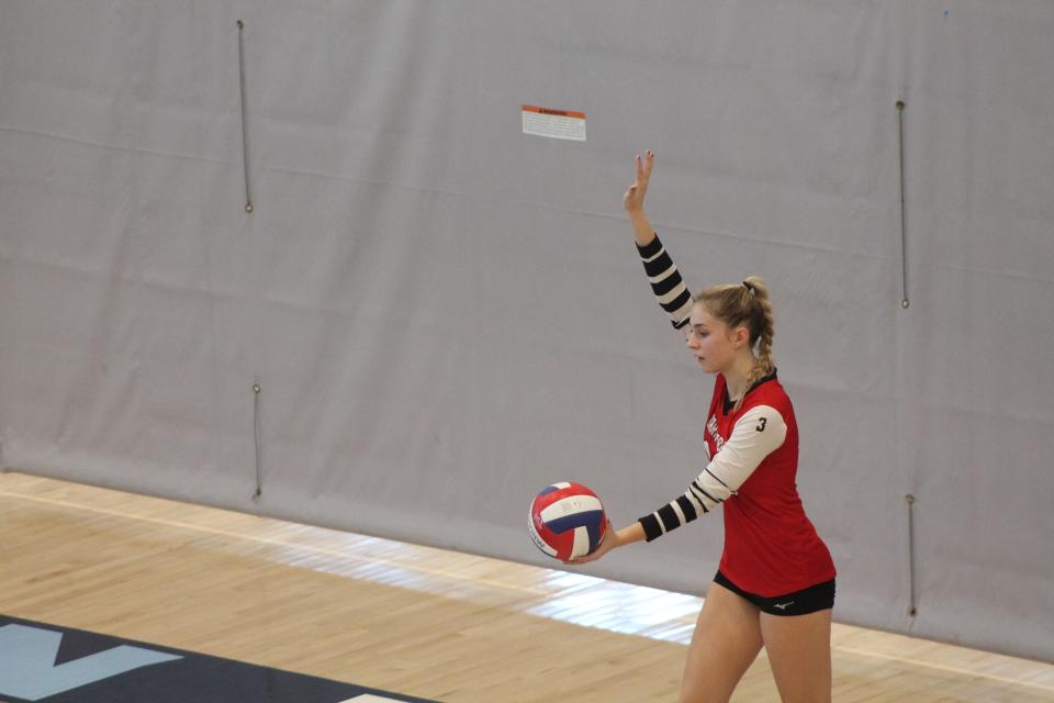 Sadie Wellbeloved serves for the Red Hawks to Franklin in the state quarterfinals matchup.