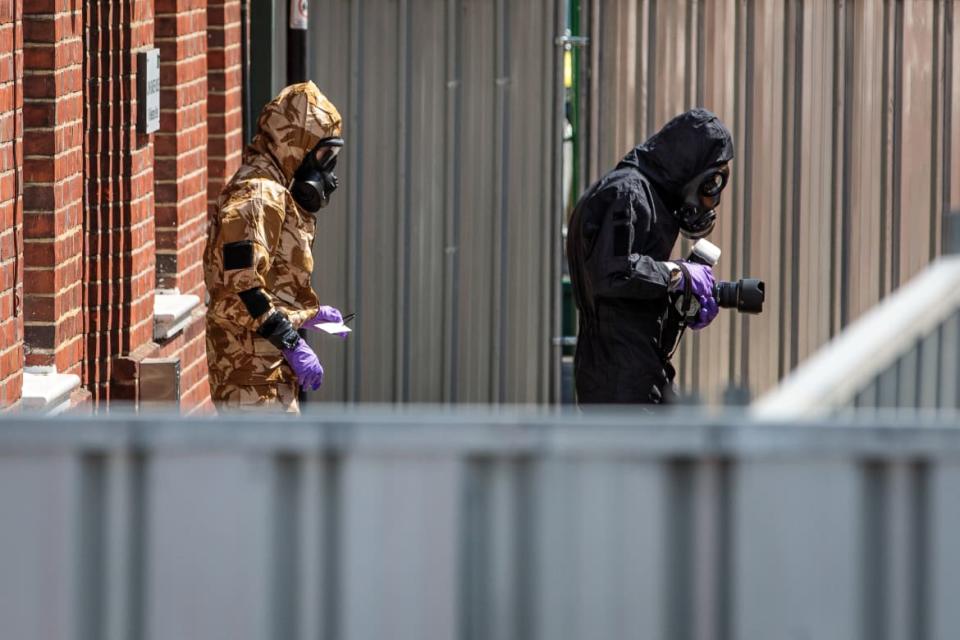 <div class="inline-image__caption"><p>Emergency workers in protective suits search a house in Salisbury, England, after a man and woman were exposed to the deadly Novichok nerve agent in July 2018, several months after the poisoning of the former Russian spy Sergei Skripal and his daughter, Yulia, in the same town.</p></div> <div class="inline-image__credit">Jack Taylor/Getty Images</div>