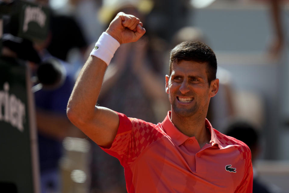 Serbia's Novak Djokovic celebrates winning his fourth round match of the French Open tennis tournament against Peru's Juan Pablo Varillas at the Roland Garros stadium in Paris, Sunday, June 4, 2023. (AP Photo/Thibault Camus)