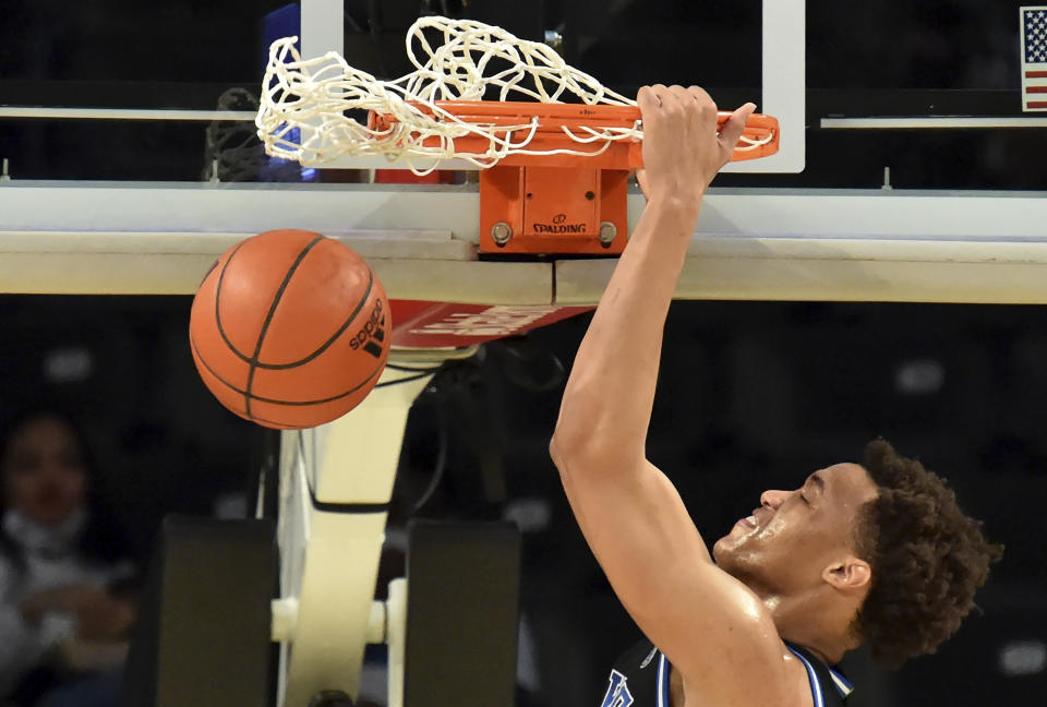 Duke forward Wendell Moore Jr. dunks against Georgia Tech during an NCAA college basketball game Tuesday, March 2, 2021, in Atlanta. (Hyosub Shin/Atlanta Journal-Constitution via AP)