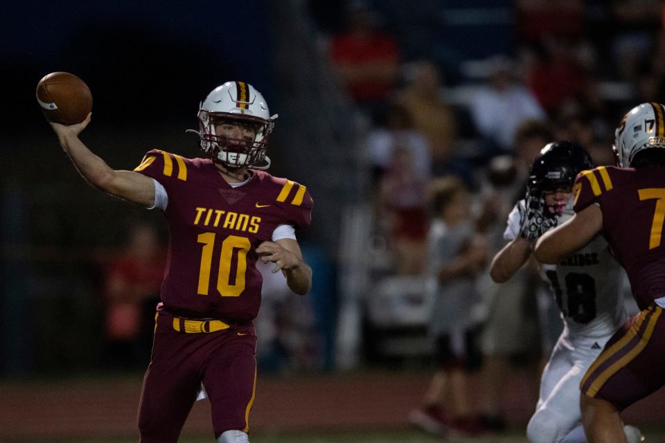 Gibson Southern’s Tanner Boyd (10) passes as the Gibson Southern Titans play the Southridge Raiders in Fort Branch, Ind., Friday, Sept. 15, 2023.