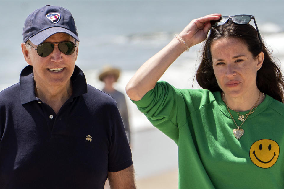 Image: President Joe Biden walks on the beach with daughter Ashley Biden, in Rehoboth Beach, Del., June 20, 2022. (Manuel Balce Ceneta / AP file)