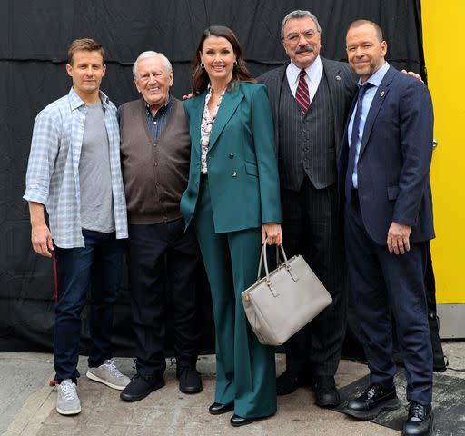 <p>Jose Perez/Bauer-Griffin/GC Images</p> Will Estes, Len Cariou, Bridget Moynahan, Tom Selleck and Donnie Wahlberg are seen on the set of "Blue Bloods" in Greenpoint, Brooklyn on May 01, 2024 in New York City.