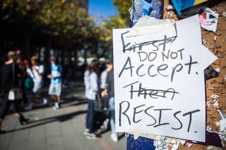 Signs across campus asking students to 