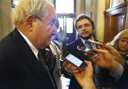 U.S. Senator Carl Levin (D-MI) talks to reporters after a Senate cloture vote on budget bill on Capitol Hill in Washington December 17, 2013. REUTERS/Yuri Gripas