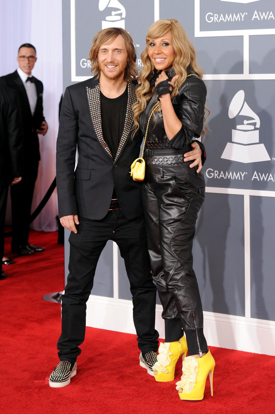 LOS ANGELES, CA - FEBRUARY 12: DJ David Guetta (L) and his wife Cathy Guetta arrive at the 54th Annual GRAMMY Awards held at Staples Center on February 12, 2012 in Los Angeles, California. (Photo by Jason Merritt/Getty Images)