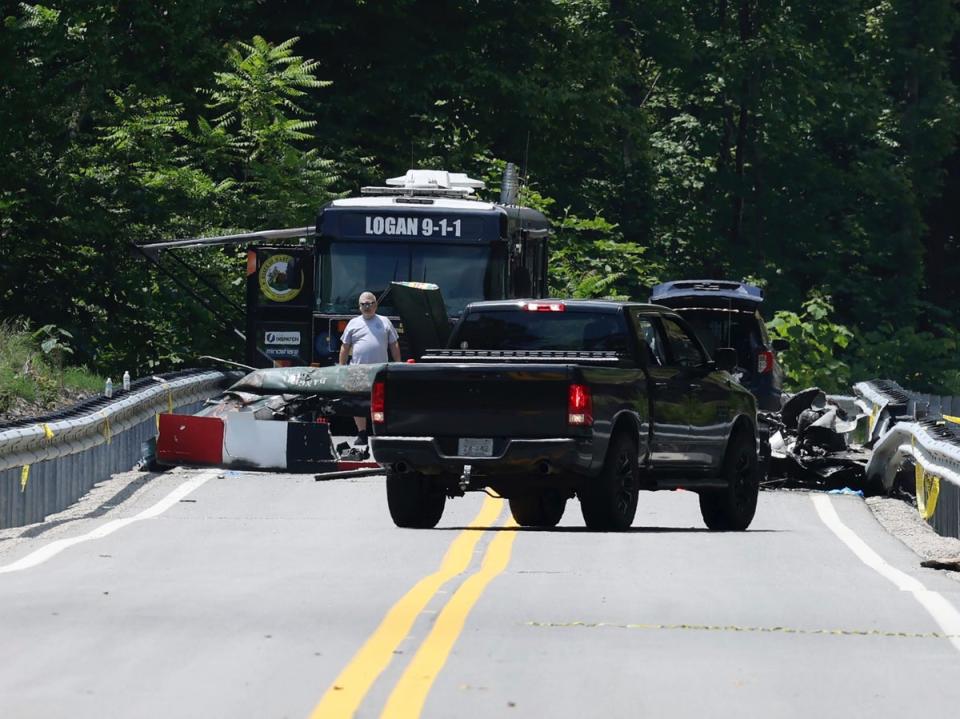 Emergency personnel at the scene of the helicopter crash in Logan County, WV (AP)