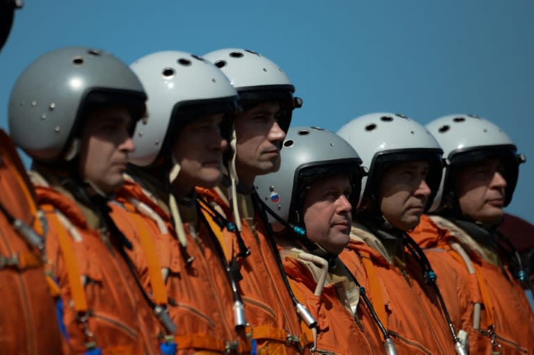 Russian Air Force pilots are pictured after landing a Tupolev Tu-160 strategic bomber at Maiquetia International Airport, Caracas on December 10, 2018