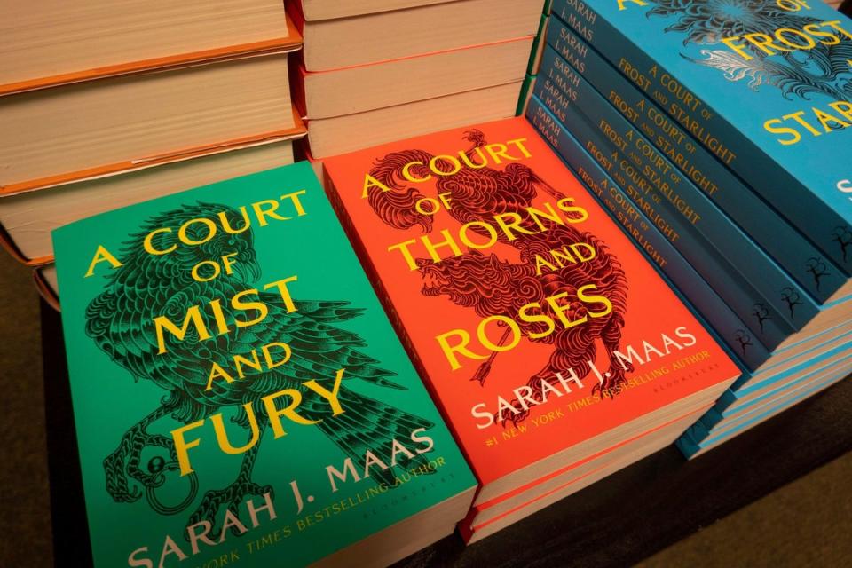 Sarah J. Maas' A Court of Thorn and Roses book series on display in a bookstore (Alamy Stock Photo)