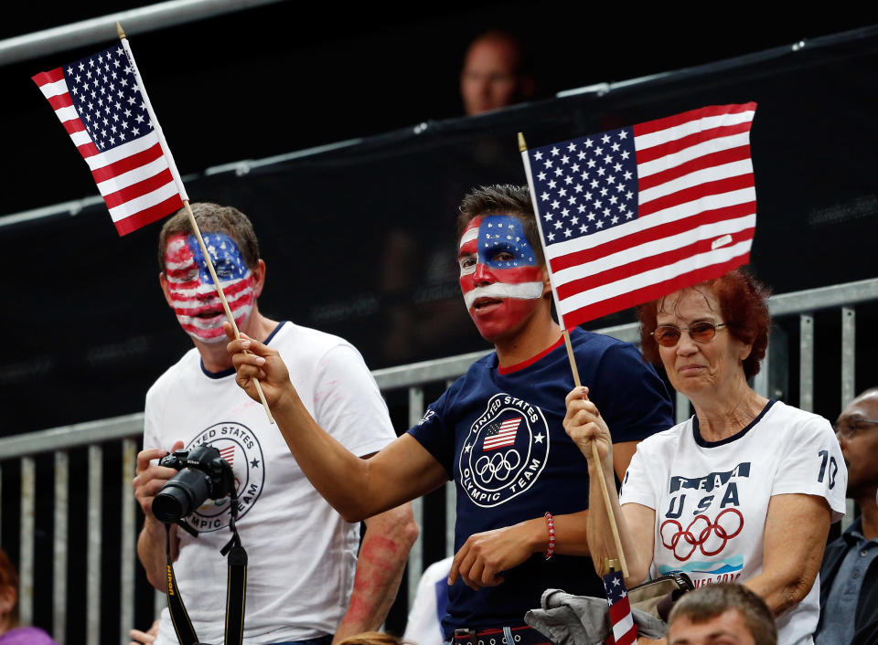 Fans of the United States cheer during their Men's Basketball Game against France on Day 2 of the London 2012 Olympic Games at the Basketball Arena on July 29, 2012 in London, England. (Getty Images)