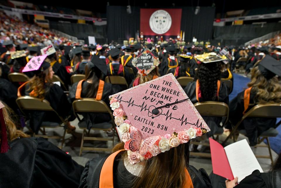 There were a lot of fun messages on caps during Anna Maria College's 74th commencement exercises at the DCU Center Monday.