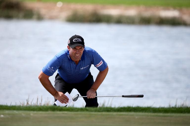 Padraig Harrington of Ireland lines up a putt during the continuation of the fourth round of the Honda Classic on March 2, 2015 in Palm Beach Gardens, Florida