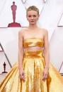 <p>Carey Mulligan's striking Valentino Haute Couture gown needed little embellishment: the star kept her beauty look classic with an elegant updo and cool-toned pink lip. </p>