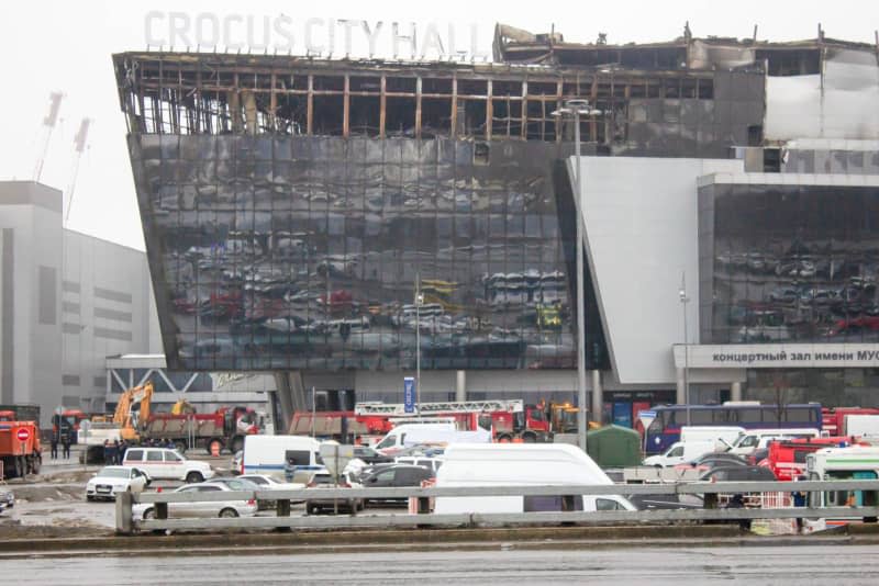 Emergency services are at the scene following an attack at a popular concert hall complex on Friday where assailants stormed the venue with guns and incendiary devices, killing at least 100 people and injuring hundreds. Vlad Karkov/SOPA Images via ZUMA Press Wire/dpa