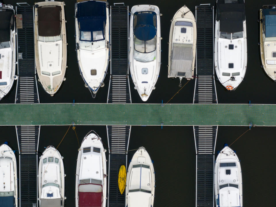 An aerial photo of boats on a river taken with the DJI Mavic 3 Pro's telephoto camera