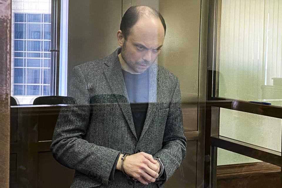 FILE In this handout photo released by the Moscow City Court, Russian opposition activist Vladimir Kara-Murza stands in a glass cage in a courtroom at the Moscow City Court in Moscow, on April 17, 2023. Kara-Murza, another top Russian opposition figure, was sentenced last month to 25 years on treason charges. (The Moscow City Court via AP, File)