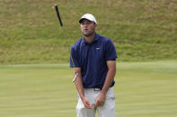 Scottie Scheffler reacts to missing a putt on the 12th hole during the semifinal round at the Dell Technologies Match Play Championship golf tournament in Austin, Texas, Sunday, March 26, 2023. Scheffler lost to Sam Burns. (AP Photo/Eric Gay)