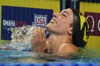 Emma Weyant reacts after winning the Women's 400 Individual Medley during wave 2 of the U.S. Olympic Swim Trials on Sunday, June 13, 2021, in Omaha, Neb. (AP Photo/Charlie Neibergall)